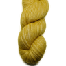 Yellow skein of yarn on a white background